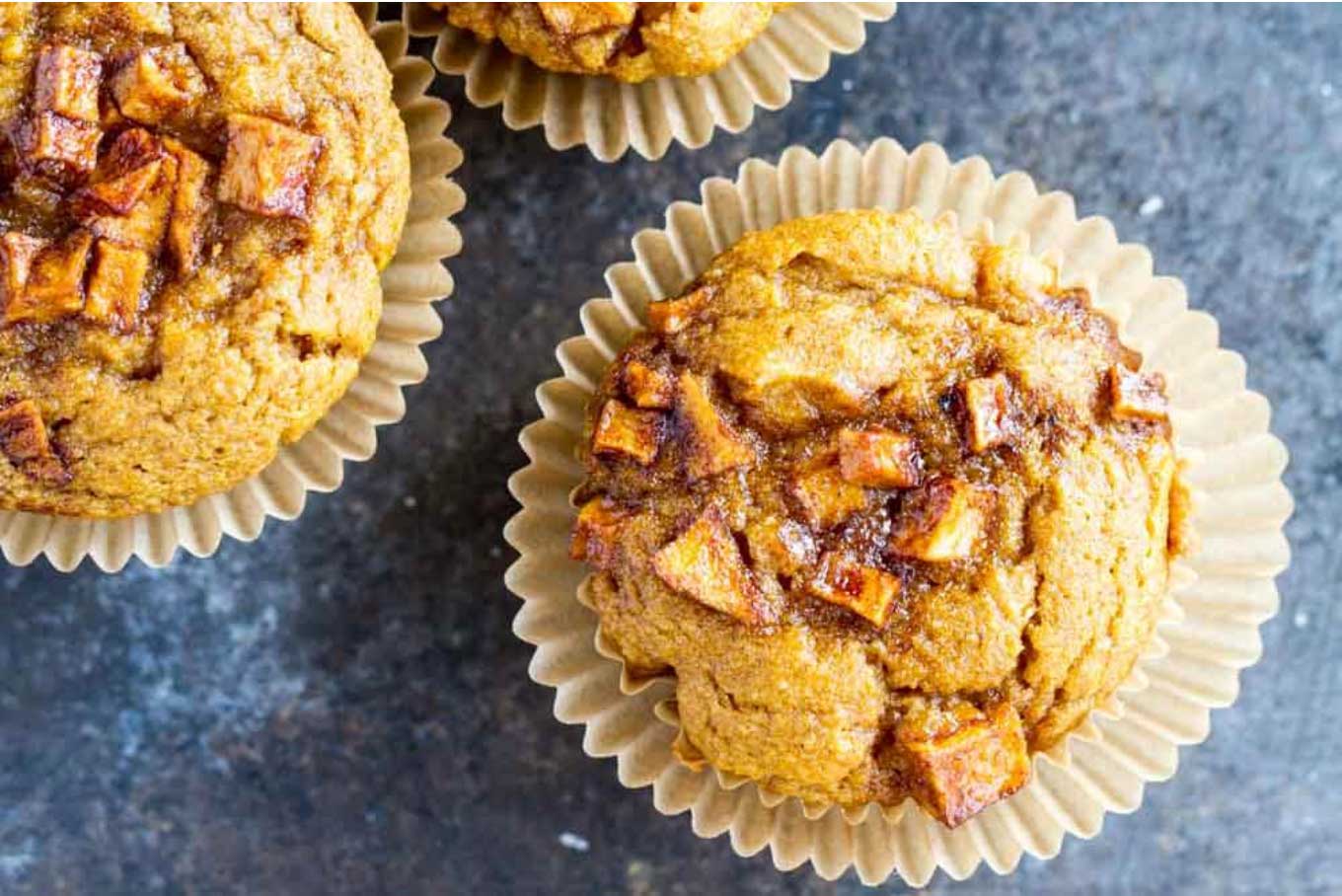 From paleo to gluten free, sugar free to whole grain! No matter what “healthy” means to you, we’ve got pumpkin muffins you’ll love! Unique flavor combos and lots of decadence … but so nutritious, too! These healthy pumpkin muffin recipes are easy to make – whip one up for quick breakfasts or healthy snacks! | pumpkin recipes | pumpkin muffins healthy | gluten free | grain free | paleo | whole wheat | refined sugar free | dairy free | #healthyrecipes #pumpkin #muffins | www.TwoHealthyKitchens.com